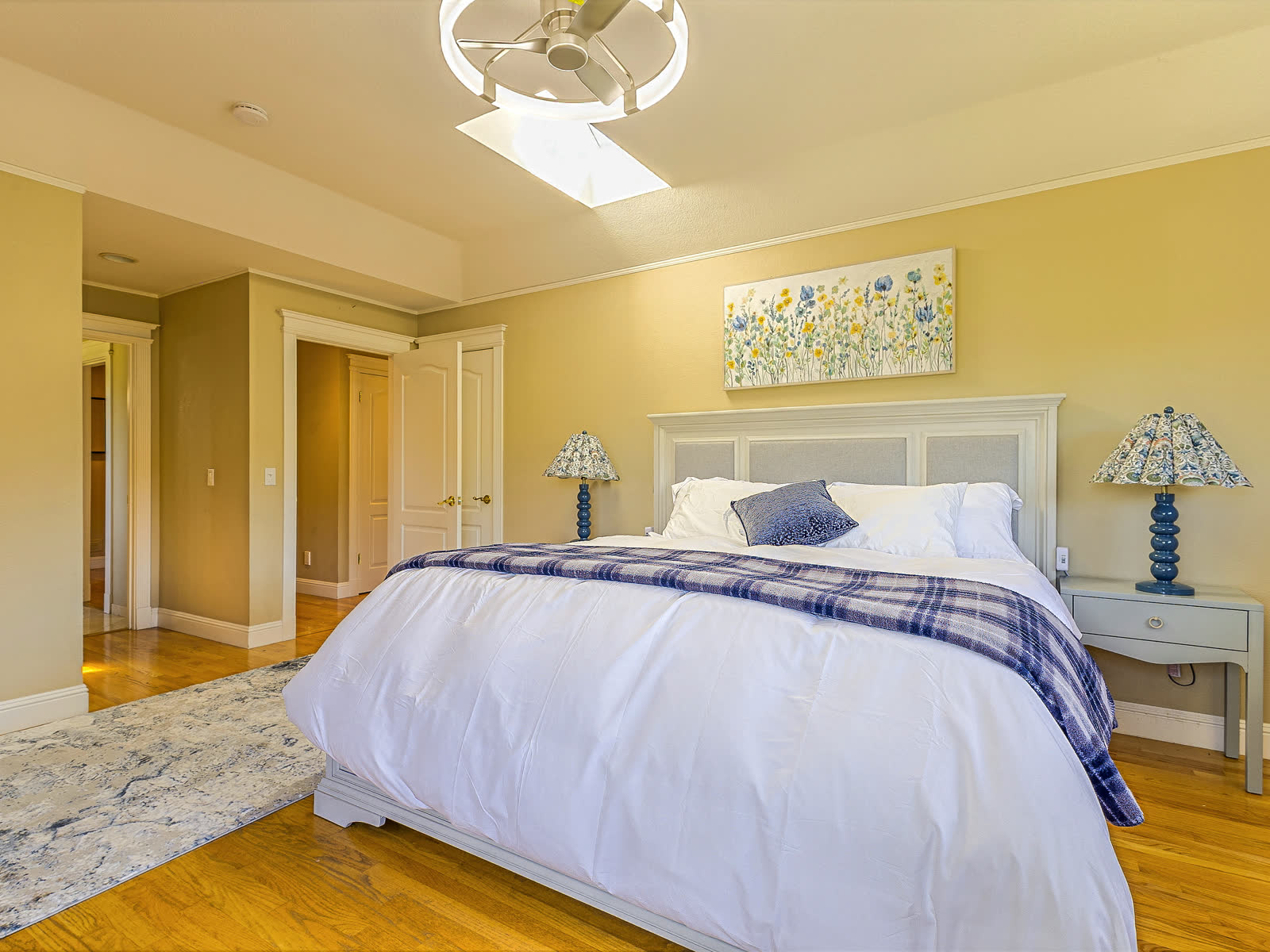 Bedroom four, on wood floors