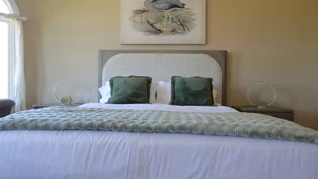 A bedroom looking out over the vineyard